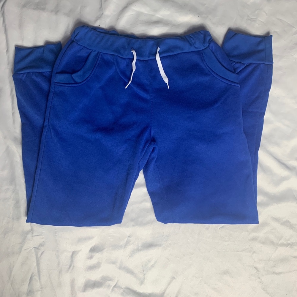 Blue sweatpants.